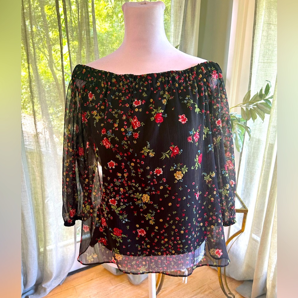 Flattering and light off the shoulder black floral 3/4 sleeve top